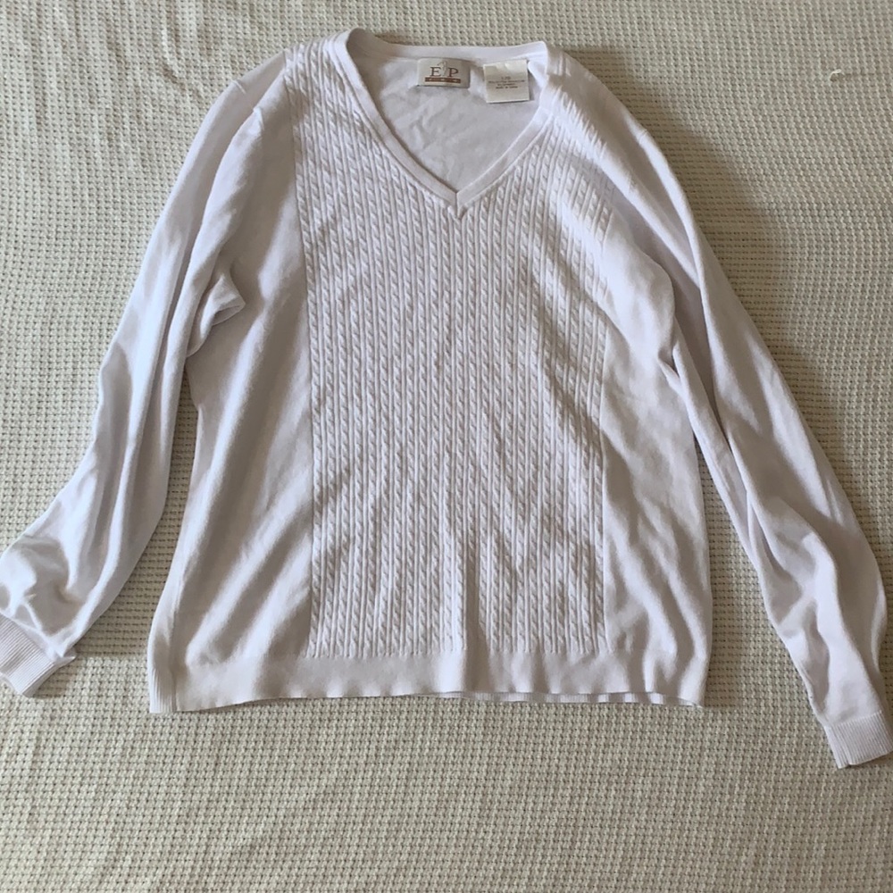 Long sleeved sweater.